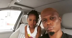 Reminisce and his daughter